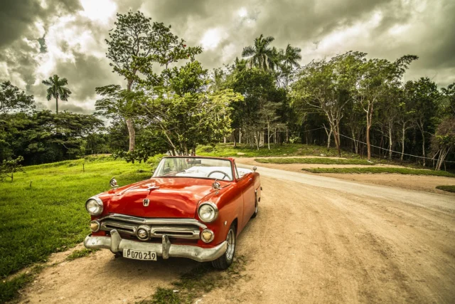 Vintage Chevrolet on an open car carrier trailer