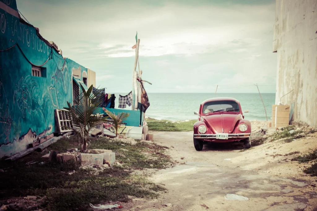 Enclosed car trailer protecting a classic car during shipping